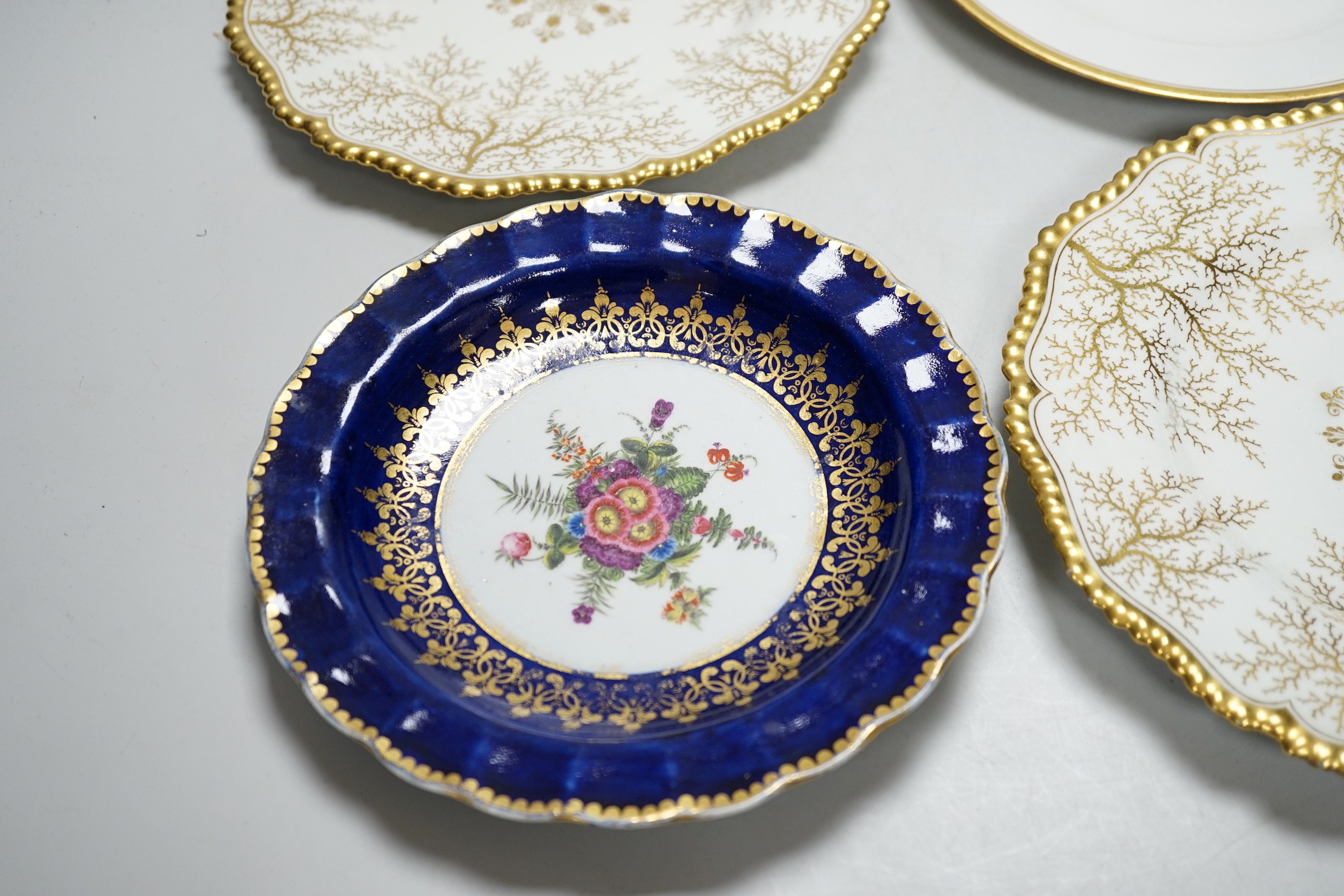 A Chamberlain's Worcester floral plate, and three Barr Flight & Barr plates, largest 22.5 cm